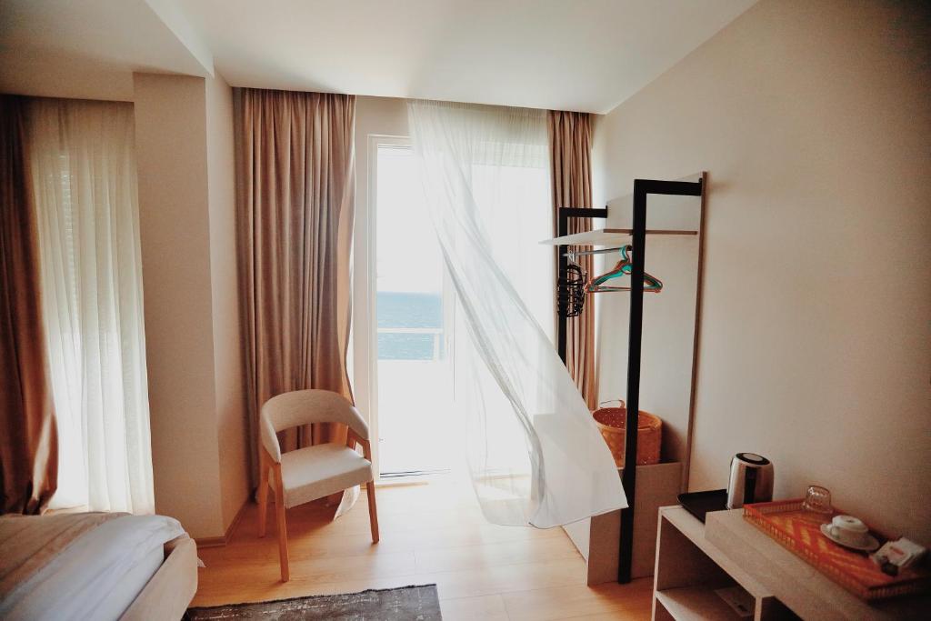 Postel nebo postele na pokoji v ubytování Grand Mirage