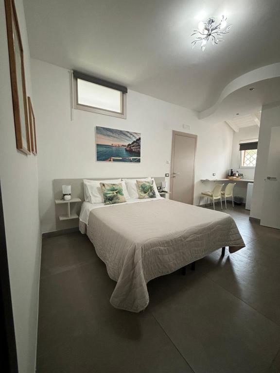 Postel nebo postele na pokoji v ubytování Biscotti s room