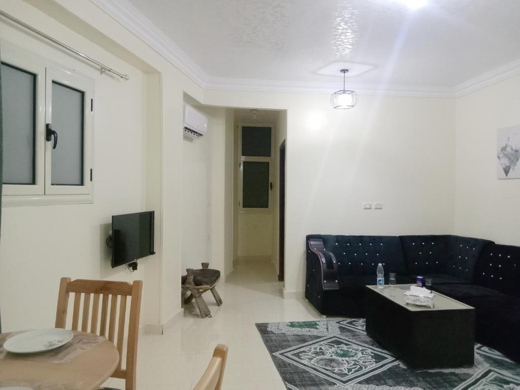 TV a/nebo společenská místnost v ubytování Giza Home Pyramids