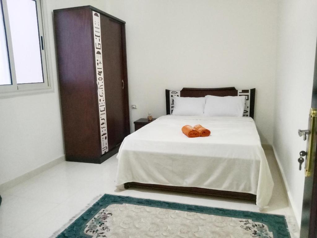 Postel nebo postele na pokoji v ubytování Giza Home Pyramids