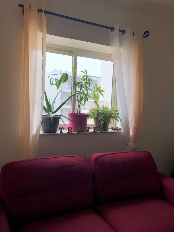 Posezení v ubytování F51 Room with private bathroom near the beach in shared apartment