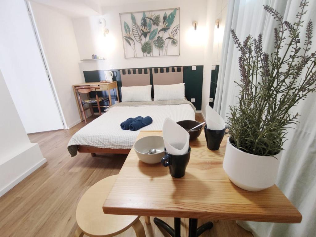 Postel nebo postele na pokoji v ubytování Suite parentale indépendante en ville - chez l'habitant