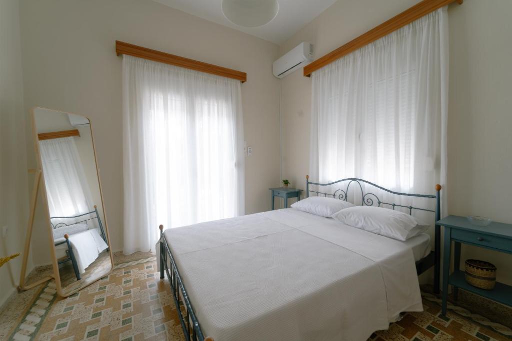 Postel nebo postele na pokoji v ubytování Selene house