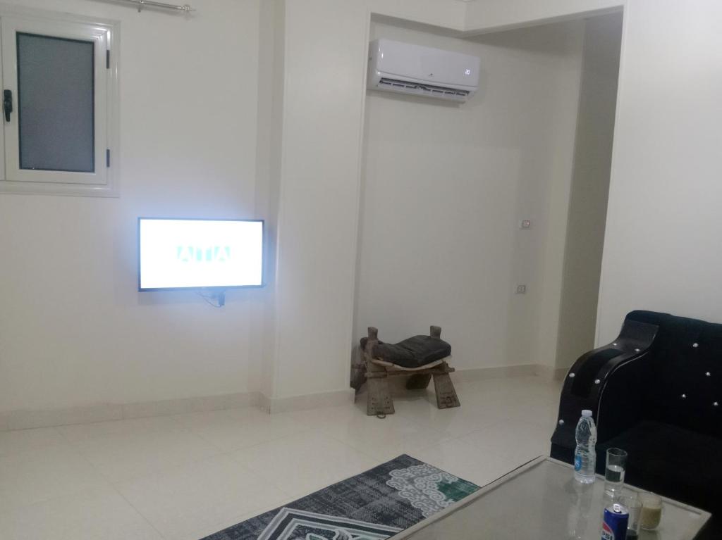 TV a/nebo společenská místnost v ubytování Giza Home Pyramids