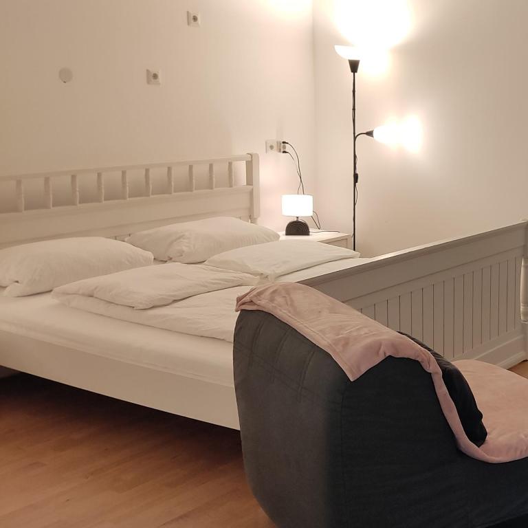 ABAI Apartments 1140 only WWW-On-line-Check-in & SelfService客房内的一张或多张床位