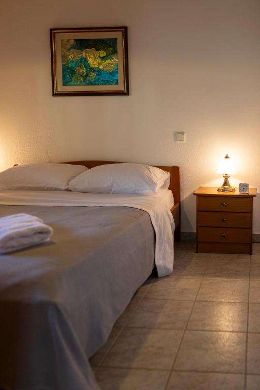 Кровать или кровати в номере Makri Beach Villa