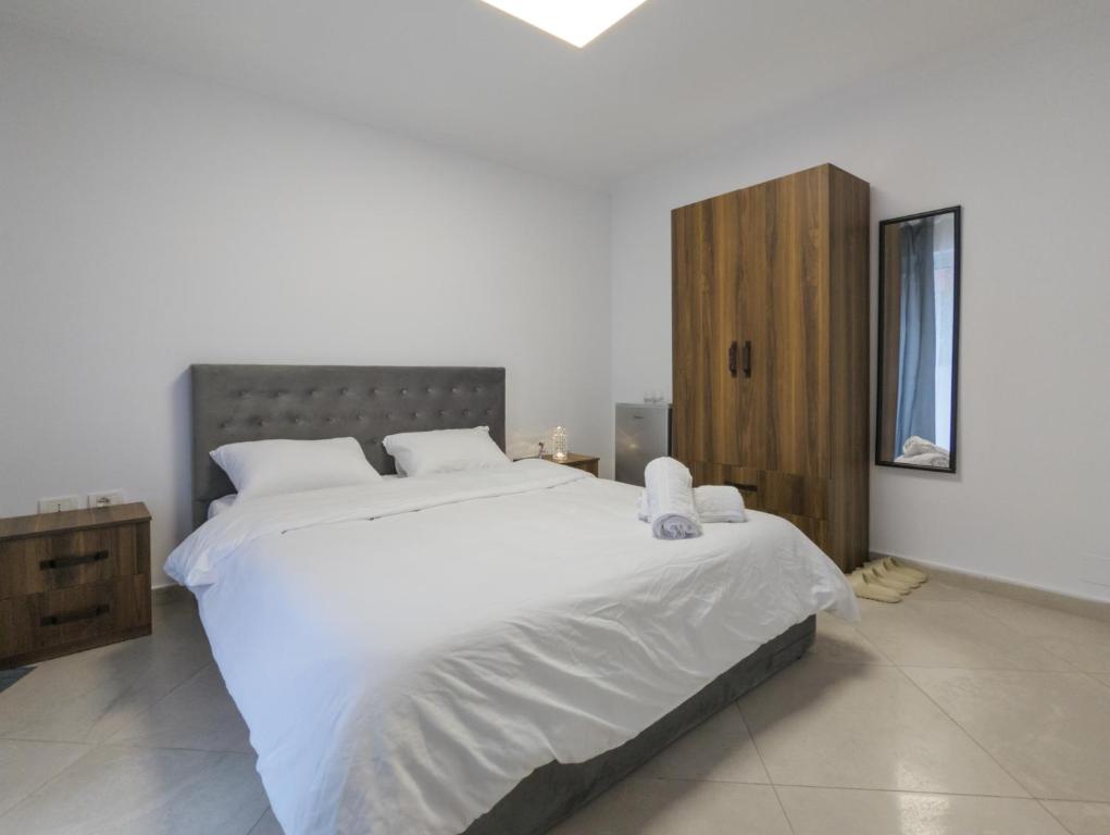 Postel nebo postele na pokoji v ubytování Center Luxury Rooms