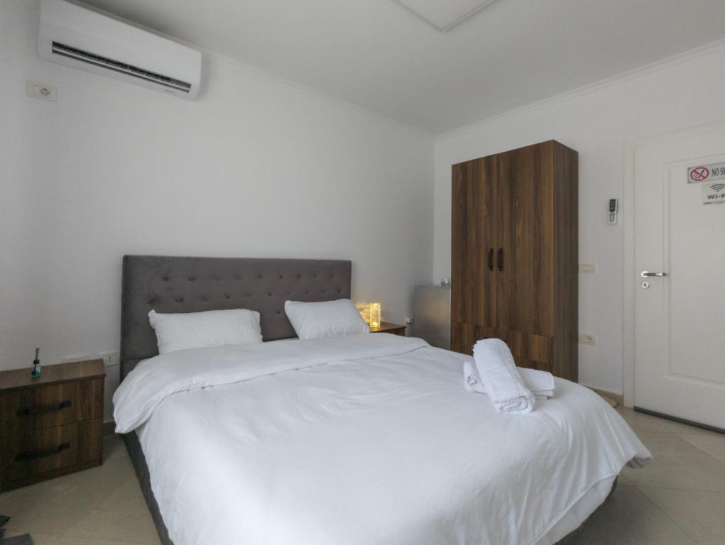 Postel nebo postele na pokoji v ubytování Center Luxury Rooms