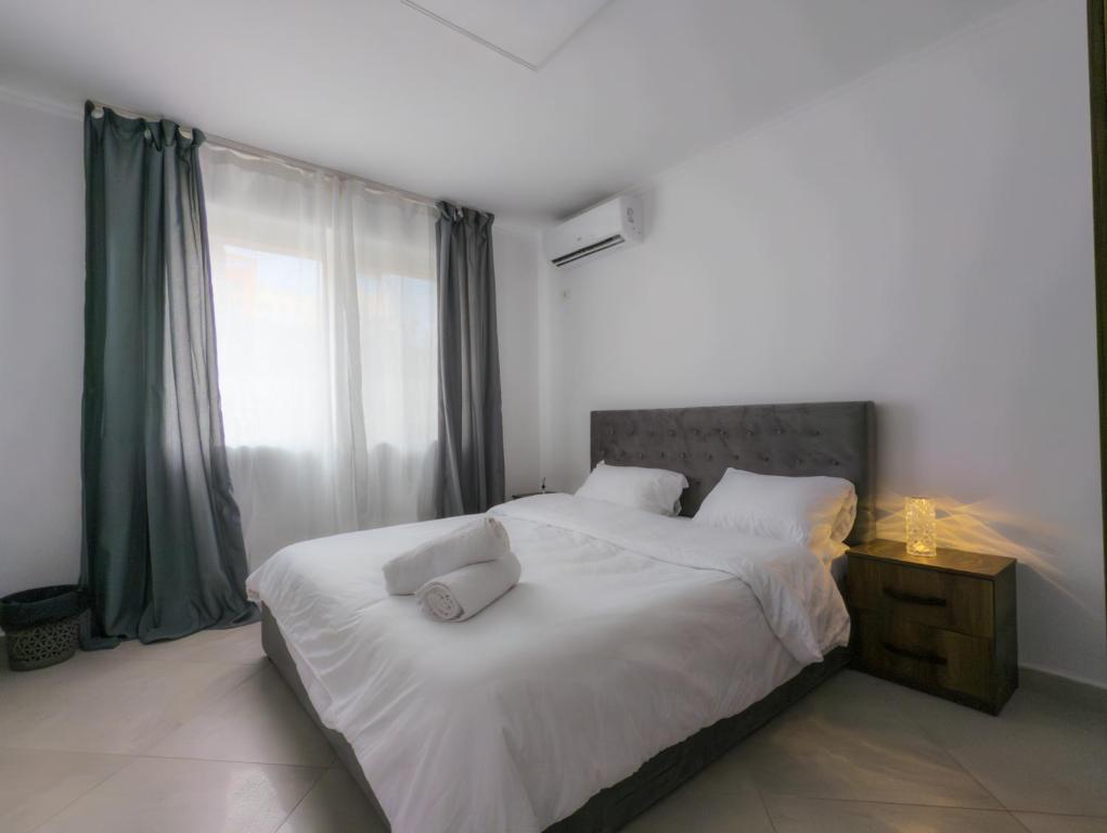 Postel nebo postele na pokoji v ubytování Center Luxury Rooms