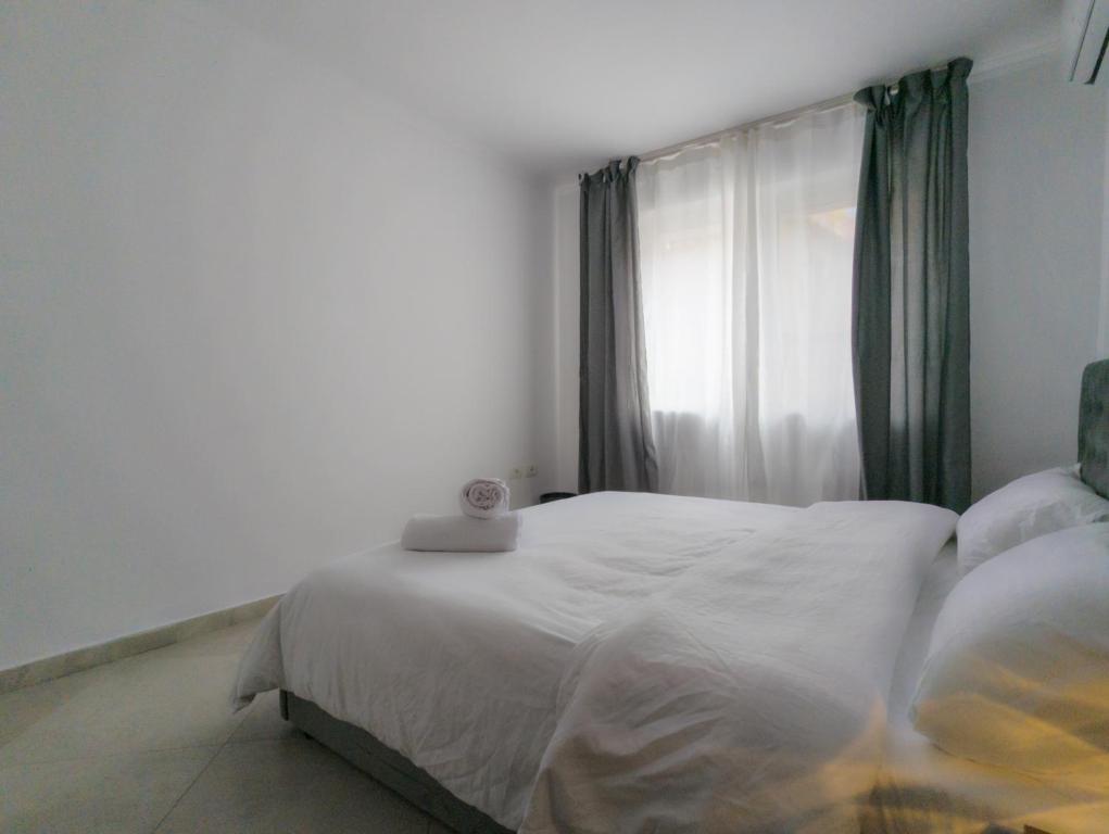 Postel nebo postele na pokoji v ubytování Center Luxury Rooms