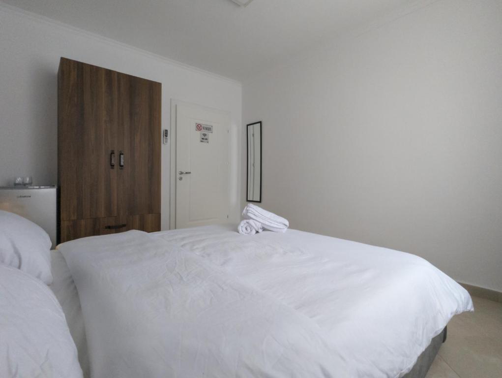 Postel nebo postele na pokoji v ubytování Center Luxury Rooms