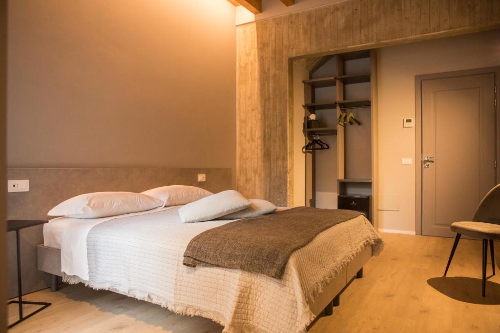 Postel nebo postele na pokoji v ubytování Residenza Castei