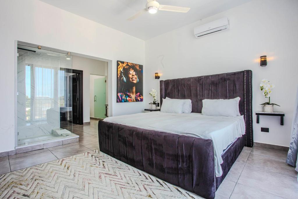 Postel nebo postele na pokoji v ubytování Instyle Residences at RIZZ SUITES
