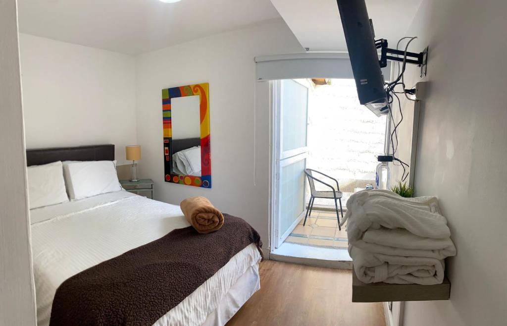 Voodi või voodid majutusasutuse Hotel Casa Madero toas