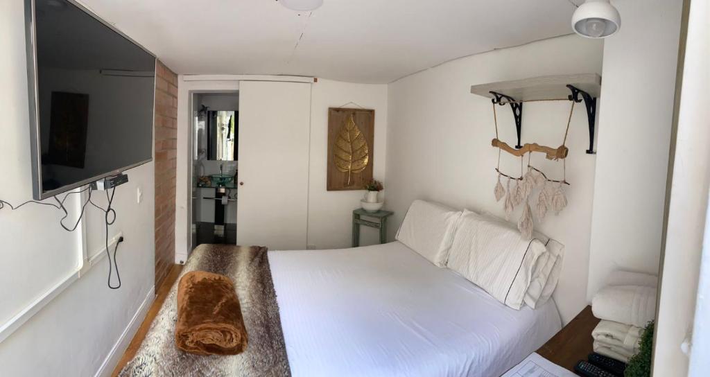Voodi või voodid majutusasutuse Hotel Casa Madero toas