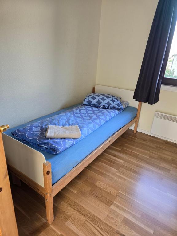 Postel nebo postele na pokoji v ubytování Florvåg -flott utsikt mot byen