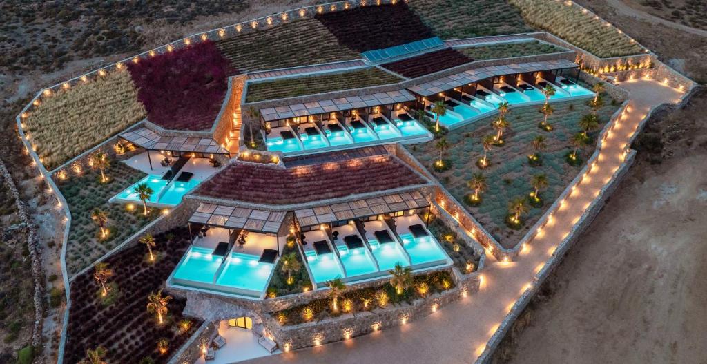 an overhead view of a building with blue lights at Ftelia Black Villas in Elia