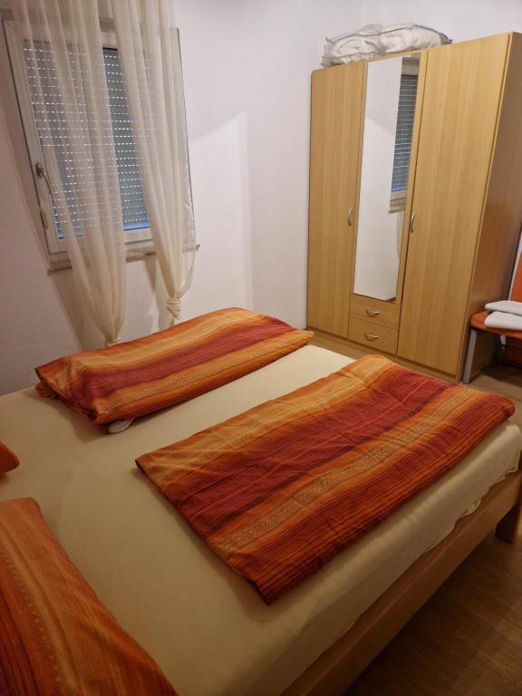Postel nebo postele na pokoji v ubytování Apartment Matošić
