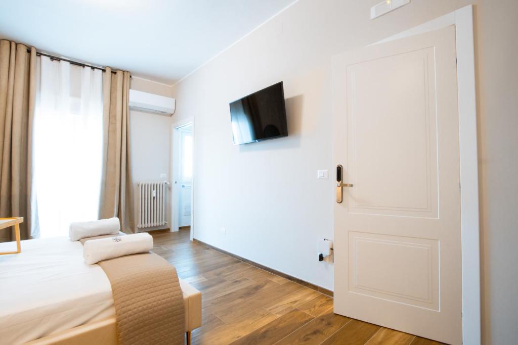 Letto o letti in una camera di Arre Mida
