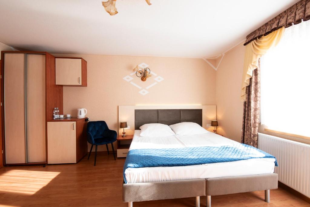 Posteľ alebo postele v izbe v ubytovaní VILLA DORA - CENTRUM, BASEN, Plac zabaw, Parking