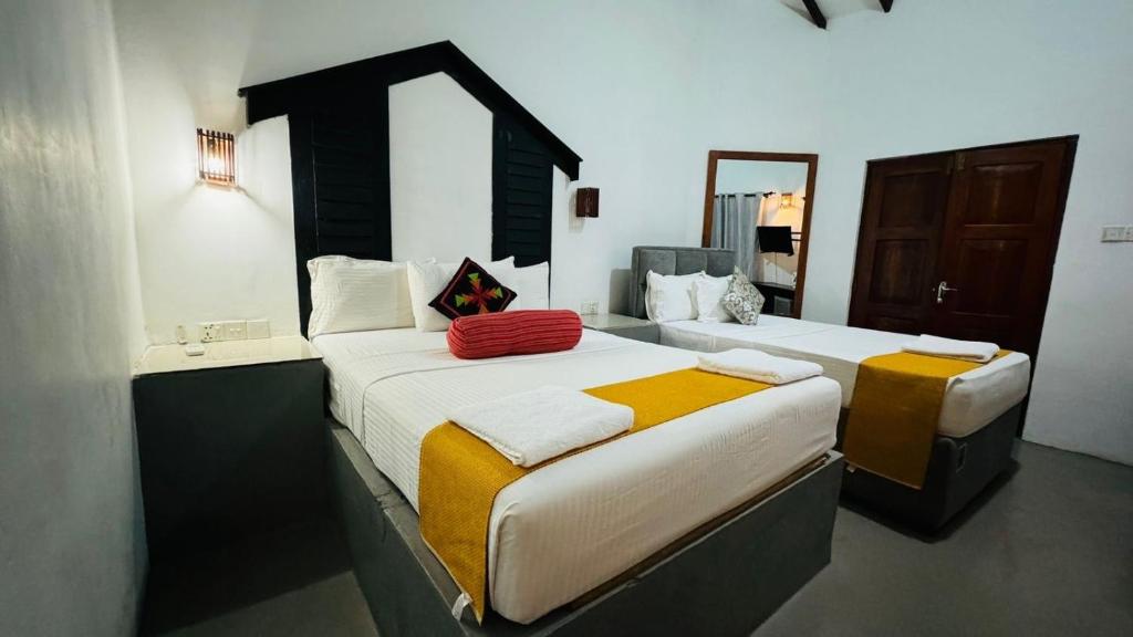 Postel nebo postele na pokoji v ubytování Sunshine Resort & Spa Sigiriya
