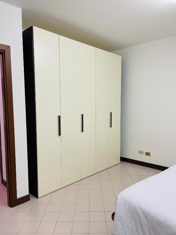 Postel nebo postele na pokoji v ubytování Apparthotel Oleggio