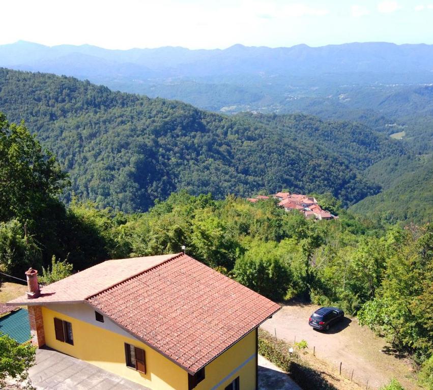 a house with a view of the mountains at Casa Atana - a Tuscan gem in Licciana Nardi