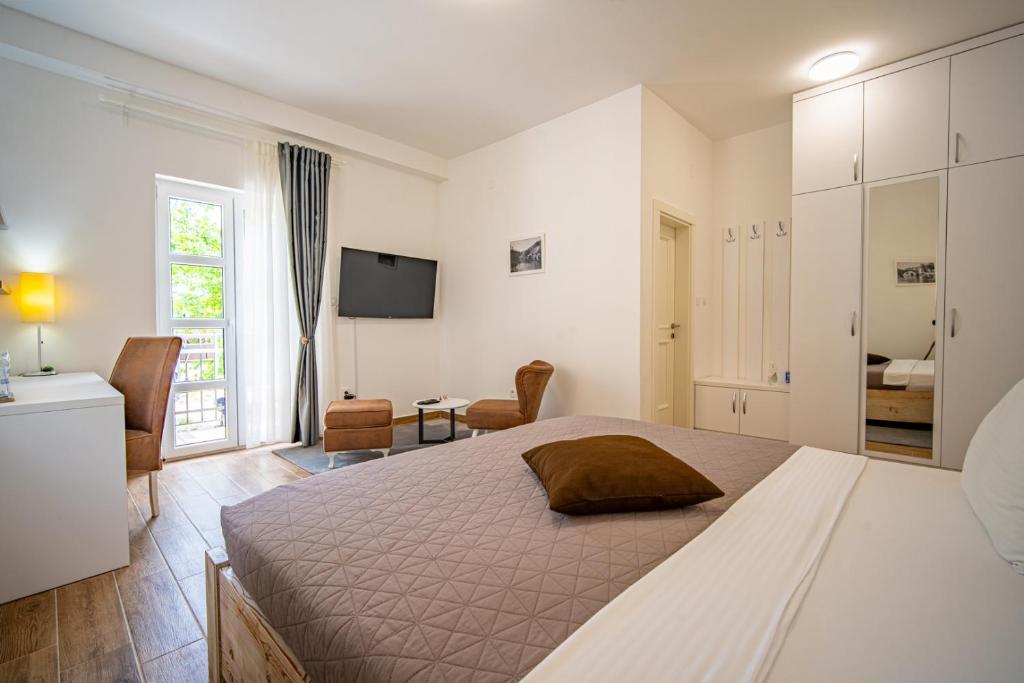 Postel nebo postele na pokoji v ubytování Skala luxury rooms