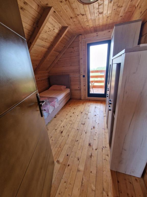 Postel nebo postele na pokoji v ubytování Bungalovi Spahic