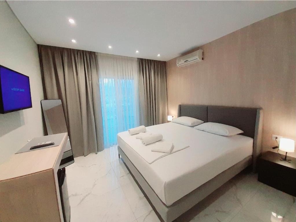 Letto o letti in una camera di GB Rooms