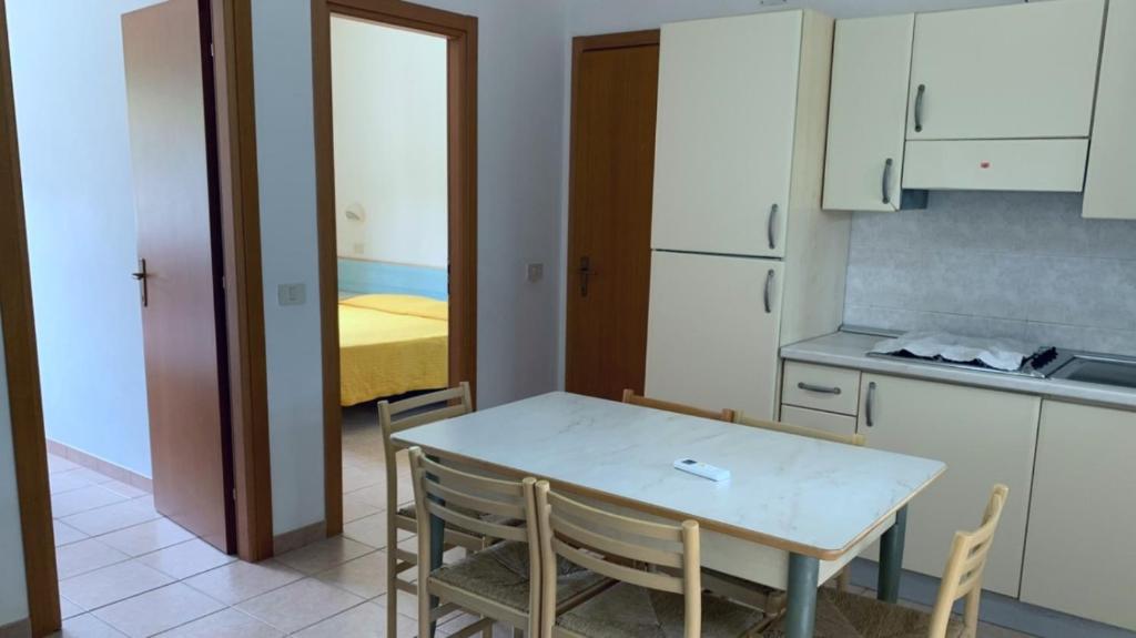 Kuchyň nebo kuchyňský kout v ubytování Villaggio La Giara