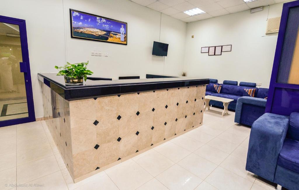 TV a/nebo společenská místnost v ubytování Al Jumhour Hotel Apartments