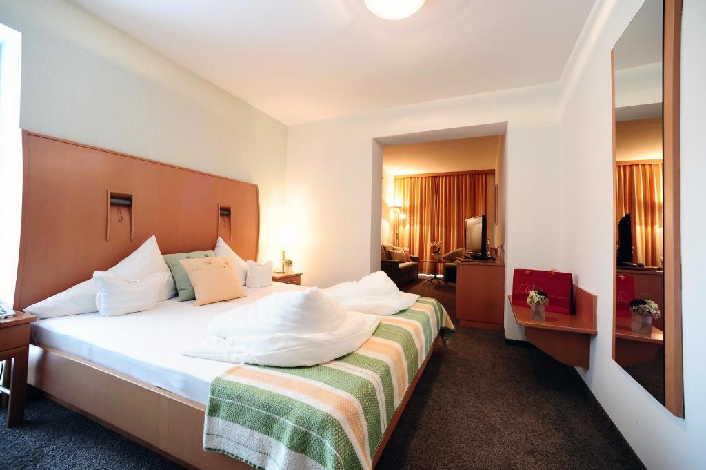 Postel nebo postele na pokoji v ubytování Hotel Restaurant Mohren