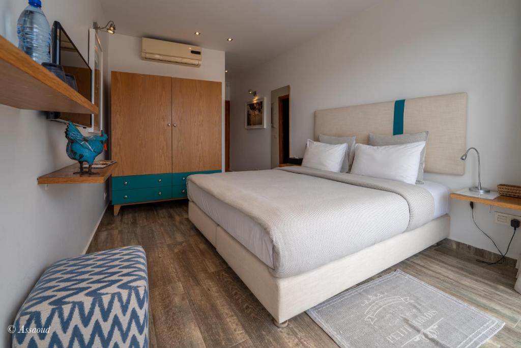 Postel nebo postele na pokoji v ubytování La Petite Chefchaouen