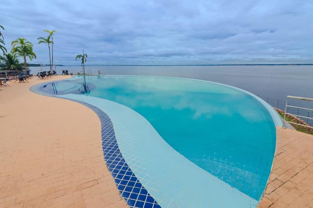 Bazén v ubytování Tropical Executive Hotel N 925 nebo v jeho okolí