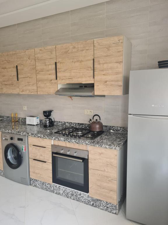 Kuchyň nebo kuchyňský kout v ubytování Villa de luxe
