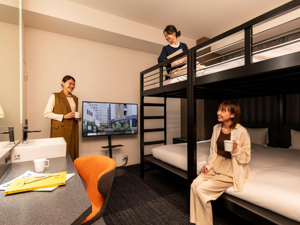 Postel nebo postele na pokoji v ubytování sequence SUIDOBASHI - Tokyo