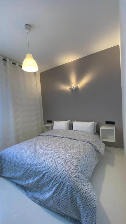 Postel nebo postele na pokoji v ubytování RABAT Residence - OCEAN STAY