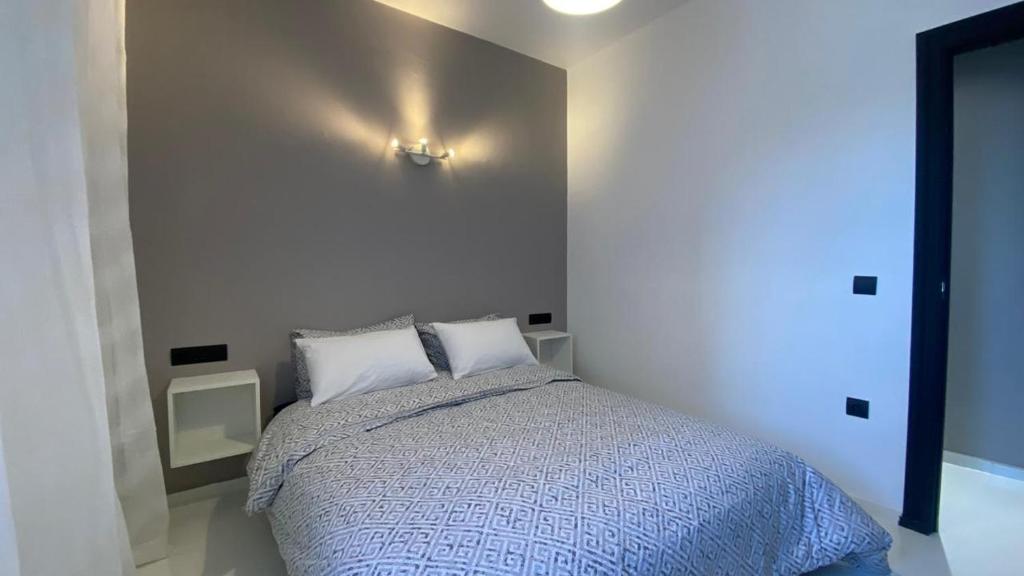 Postel nebo postele na pokoji v ubytování RABAT Residence - OCEAN STAY