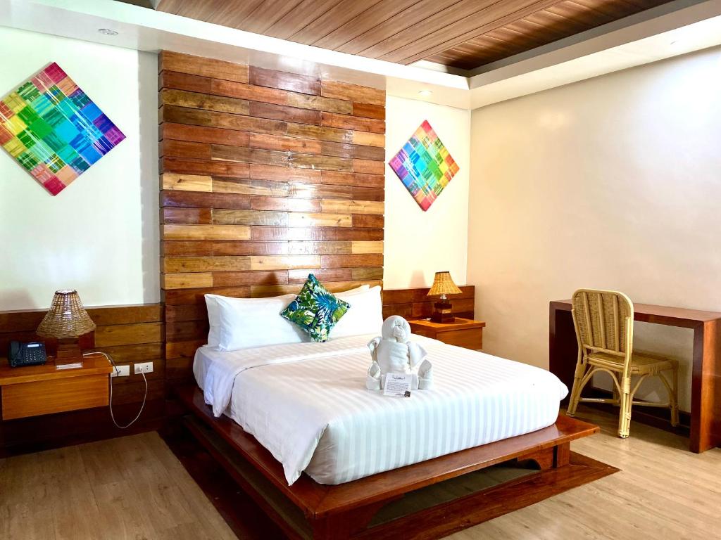 Postel nebo postele na pokoji v ubytování The Nest El Nido Beach Resort