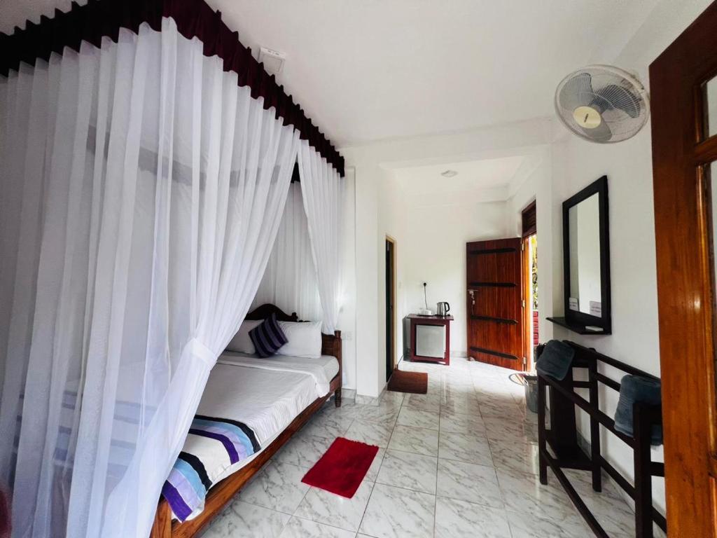 Postel nebo postele na pokoji v ubytování Rest Full Homestay
