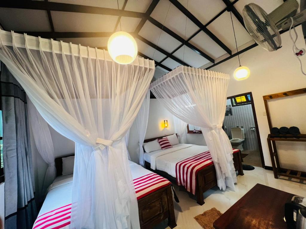 Postel nebo postele na pokoji v ubytování Rest Full Homestay
