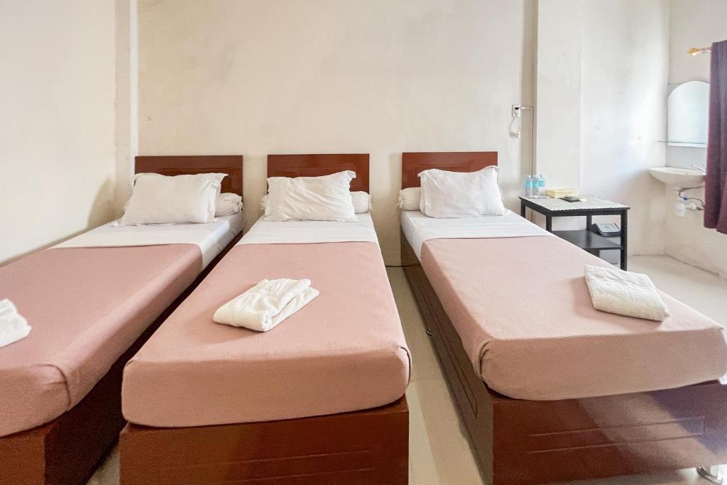 Urbanview Poma Hotel - Tripla Stanza
