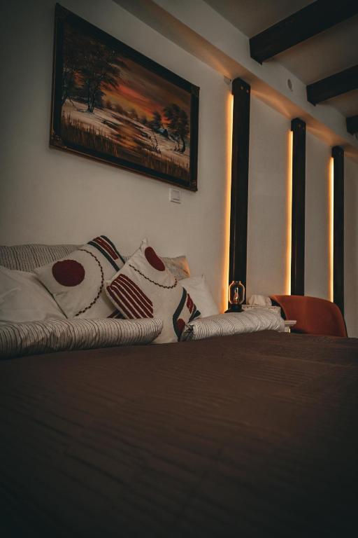 Postel nebo postele na pokoji v ubytování Kisház Apartman