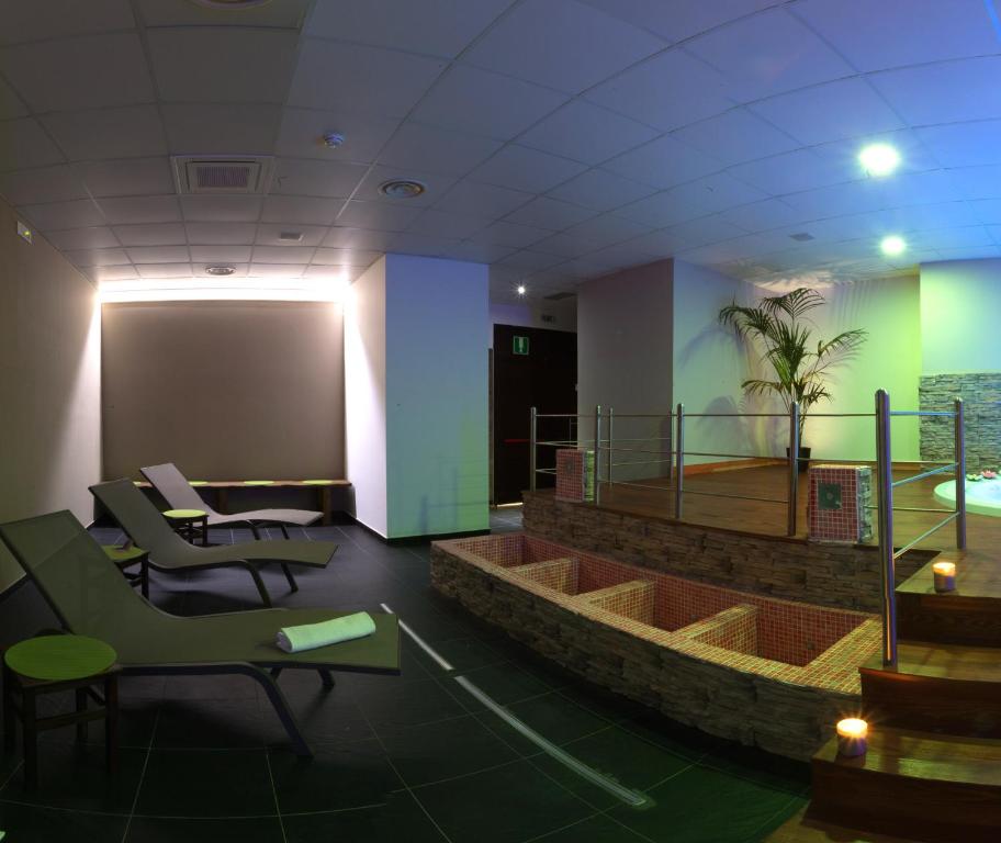 Posezení v ubytování Heraclea Hotel Residence