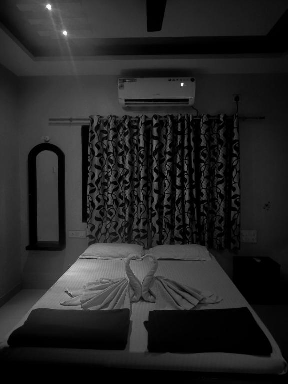 Postel nebo postele na pokoji v ubytování Konkan Villa Dream