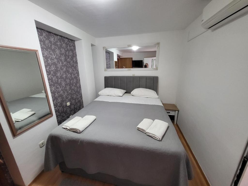 A bed or beds in a room at Guest Accomodation Žura