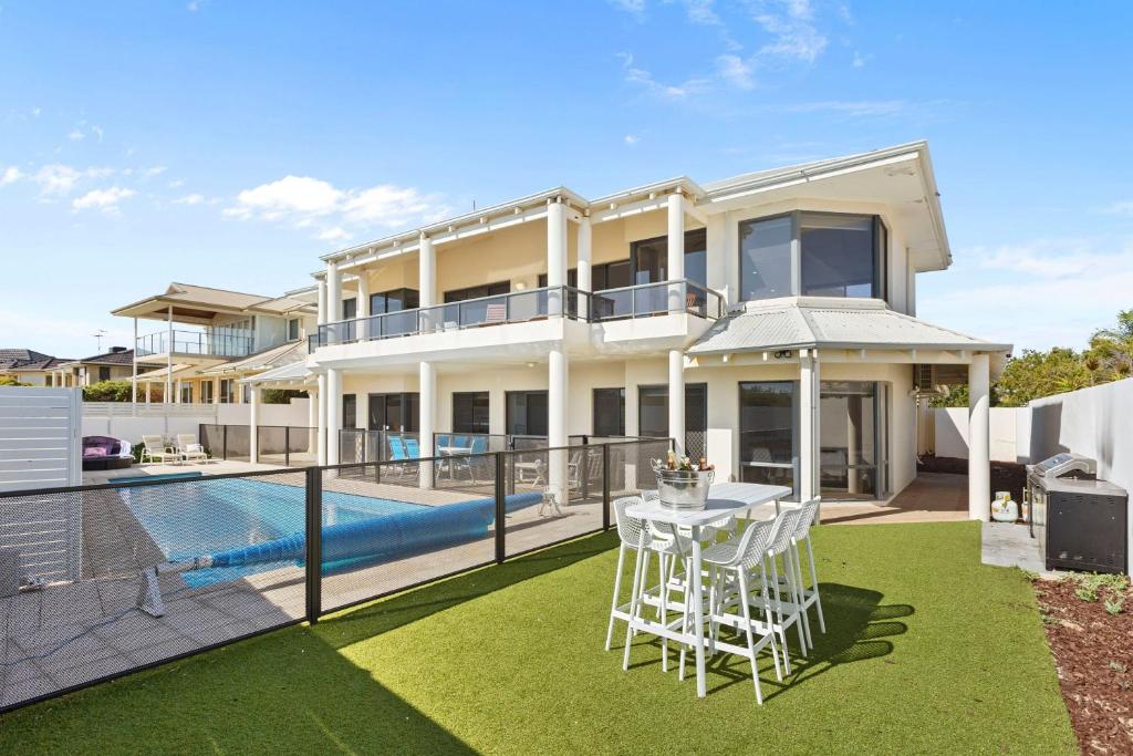 an image of a house with a swimming pool at Beachfront Escape Private Pool and Beach Access in Mandurah