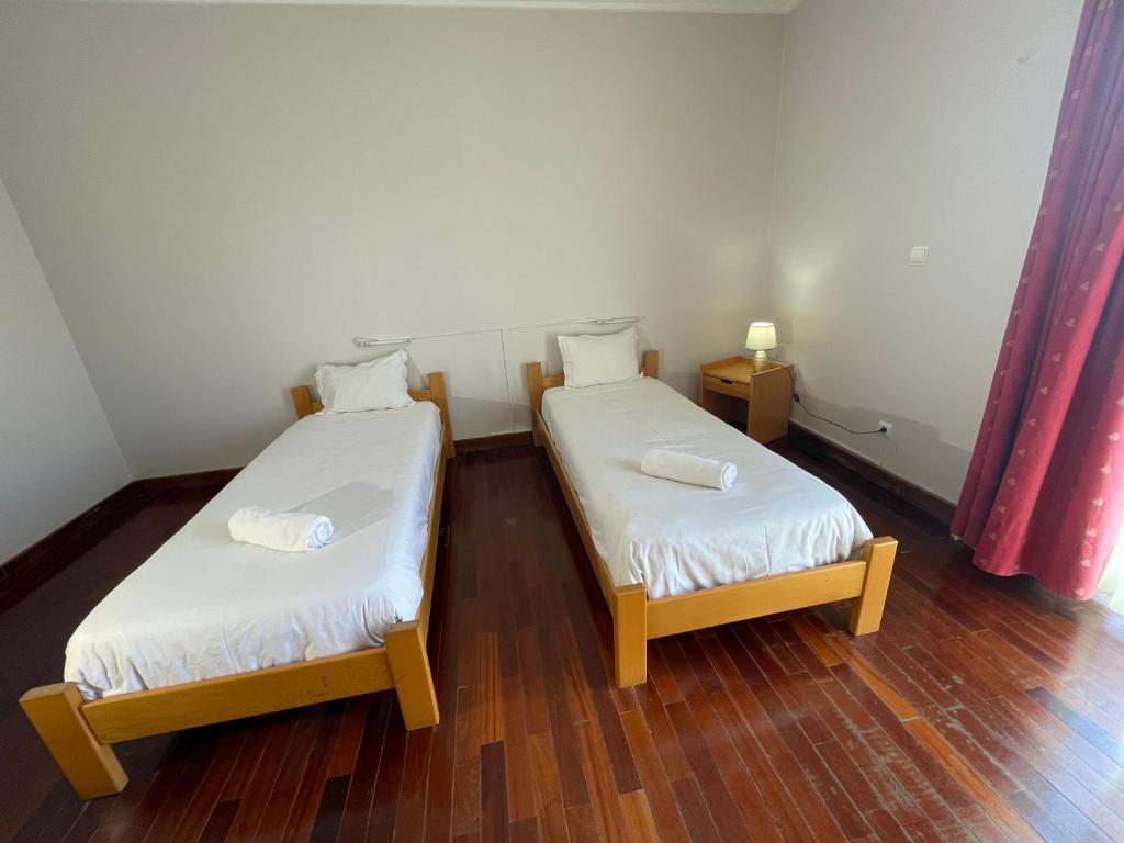 Cama ou camas em um quarto em HI Bragança – Pousada de Juventude