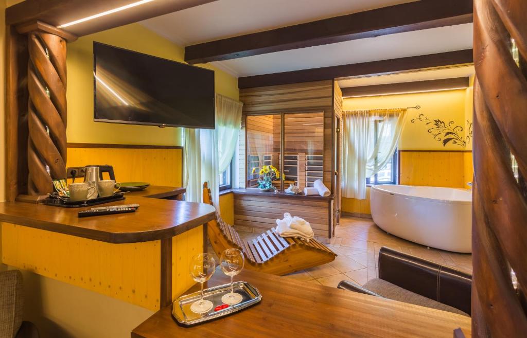 Kuchyň nebo kuchyňský kout v ubytování Ruunawere Hotel